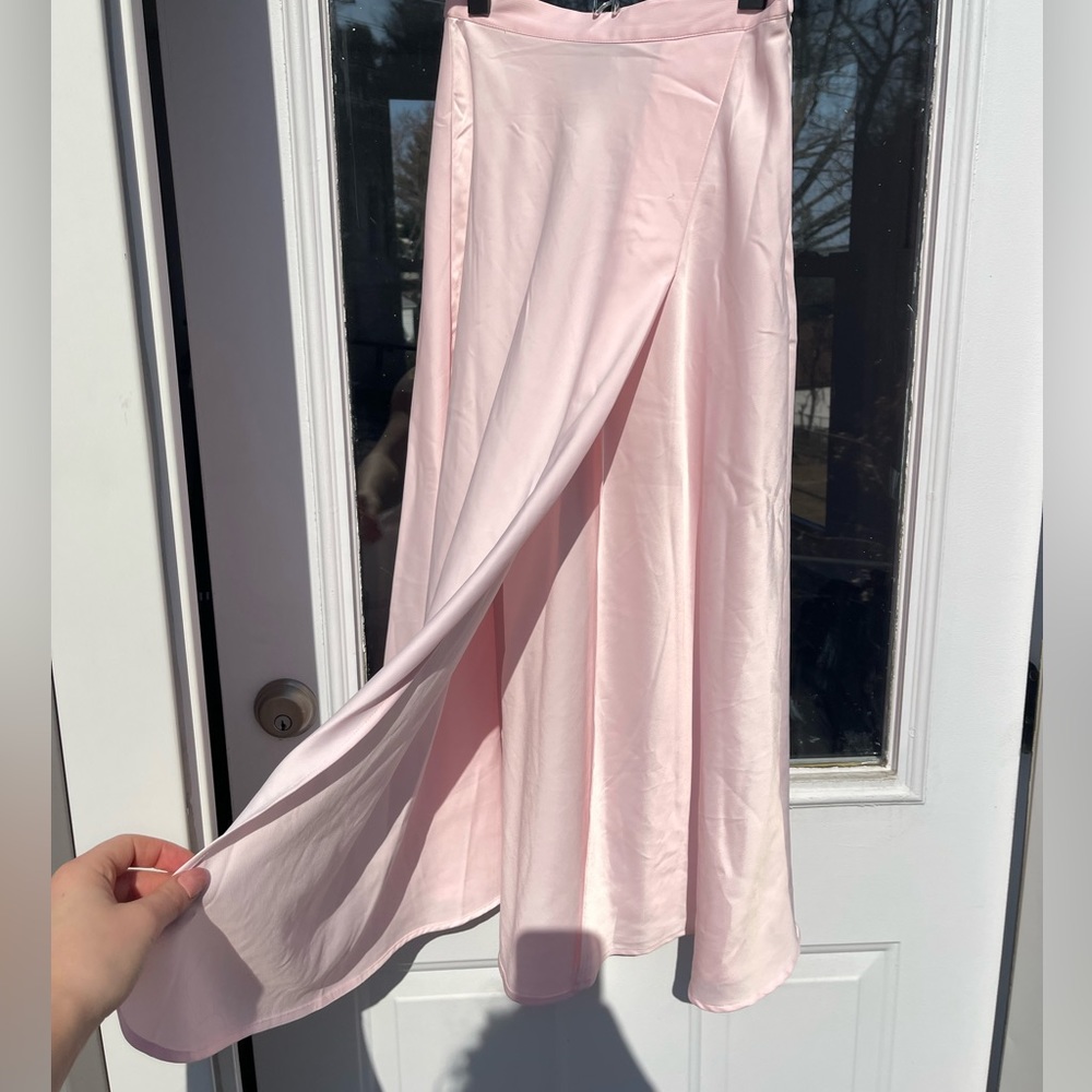 Pink satin effect midi skirt with slit